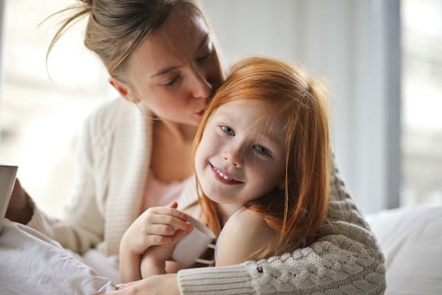 A mother and child in Coral Springs, symbolizing the importance of financial support for a child’s well-being.