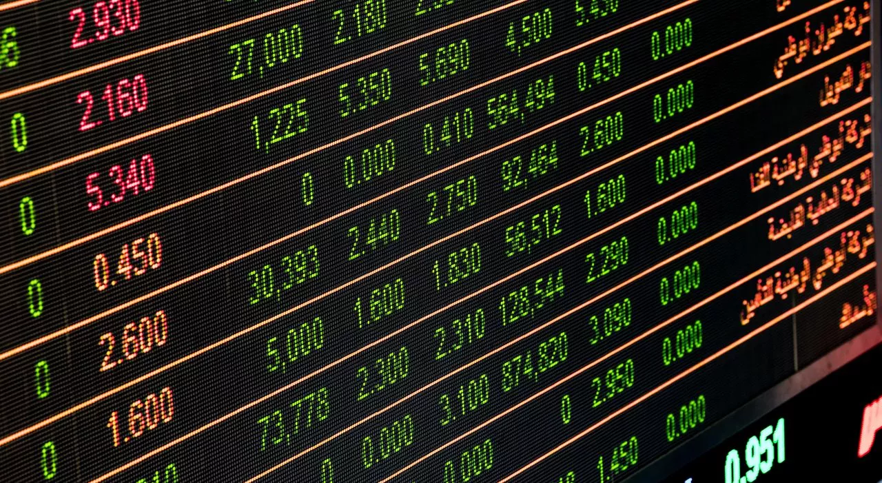 Stock market charts and financial data representing stock options and executive compensation in a Florida divorce case.
